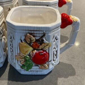Charming Ceramic Mugs with Fruit Accents